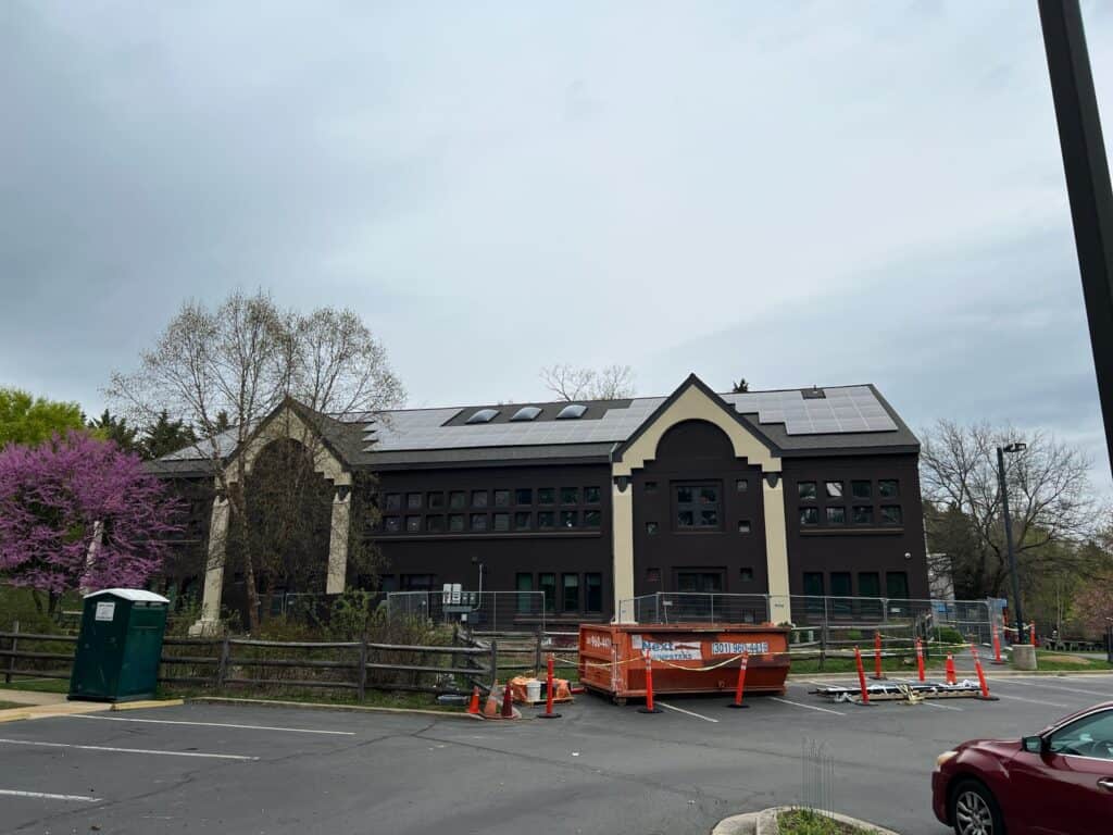 Professional solar panel installer in Westminster, MD installing rooftop panels for local homeowners