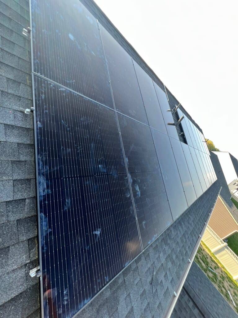 Solar Panel Installer in Perry Hall, MD securing rooftop panels during a residential energy upgrade